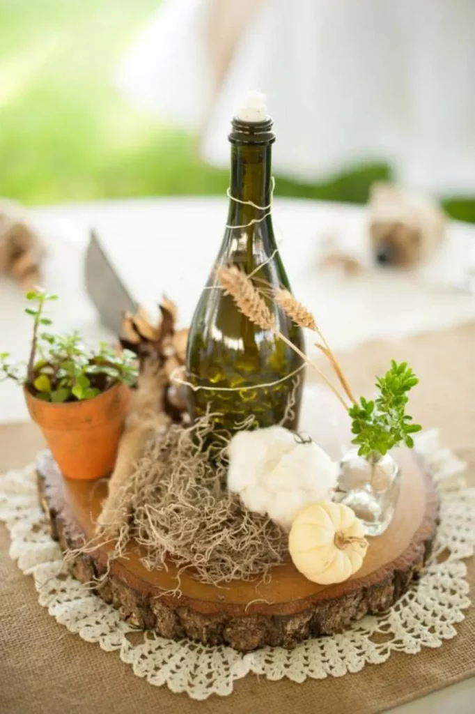Wine Bottle Centerpieces With Lights And Flowers